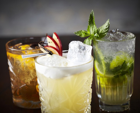 Three craft cocktails at a Key West bar
