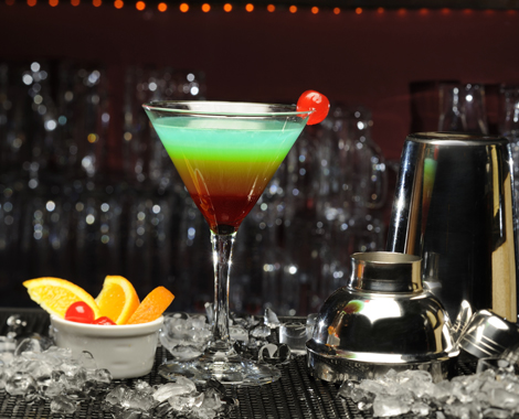 Layered tropical martini cocktail